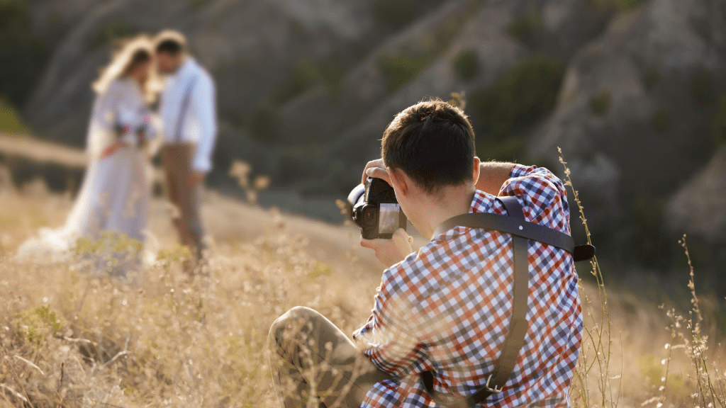 A self-employed wedding photographer working on location, representing how freelancers and independent workers can save on health insurance costs